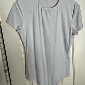 White Short Sleeve bodysuit. Size L